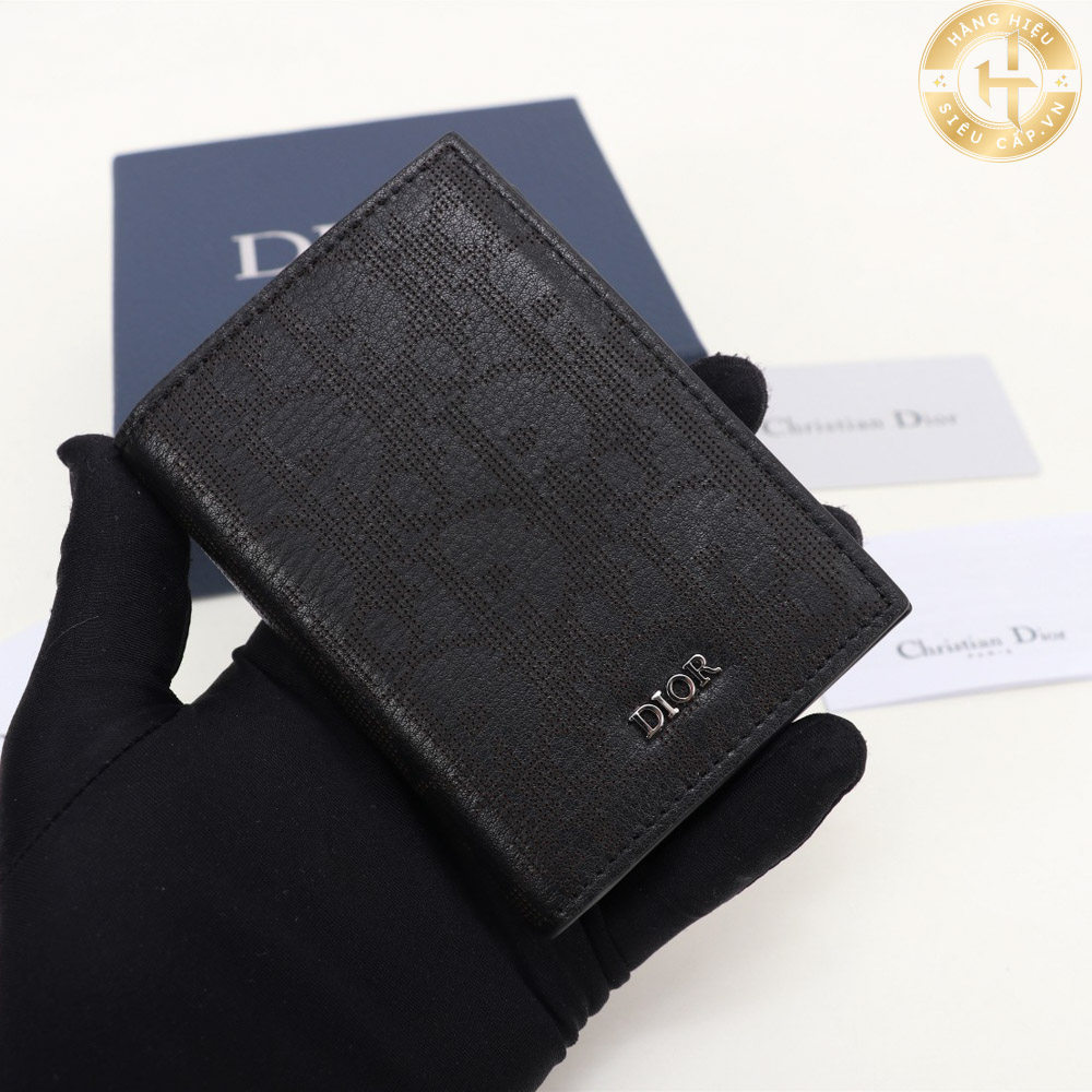 Ví Christian Dior Mini màu đen hoạ tiết ẩn Logo Hàng Hiệu cao cấp 112 được làm từ chất liệu da cao cấp.